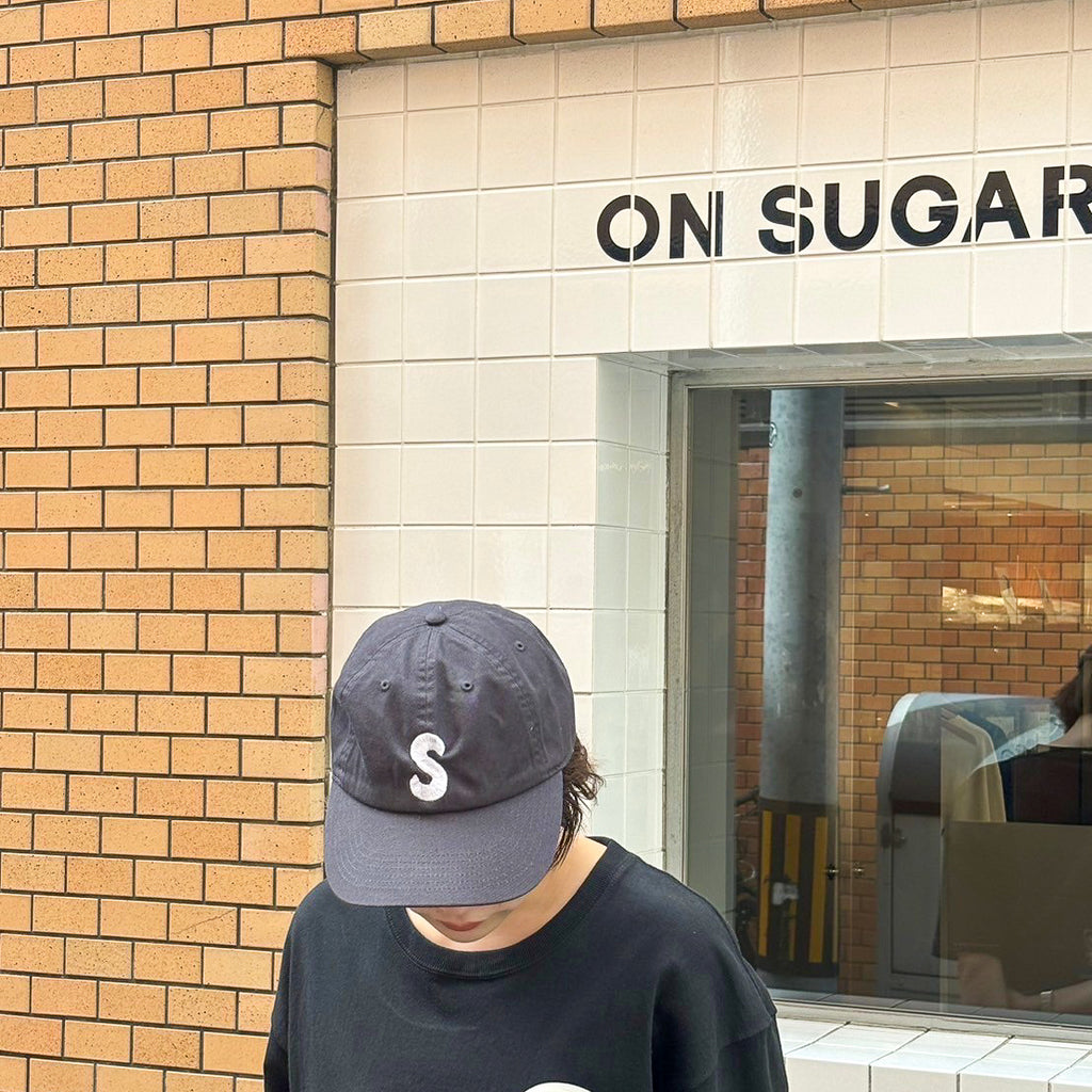 S logo CAP